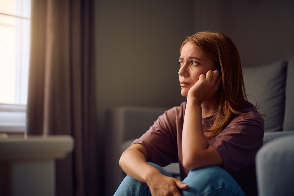 Sad woman thinking.